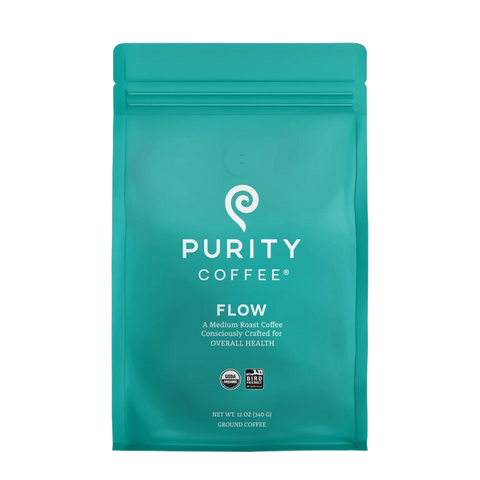 Medium-roast ground coffee bag labeled "FLOW" from Purity Coffee, designed for general health and enhanced mental focus.