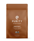 Lys-middels brent helbønnekaffepose merket "Protect" fra Purity Coffee, designet for leverstøtte og metabolisme.